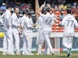 England celebrate a wicket against India on January 28, 2024.