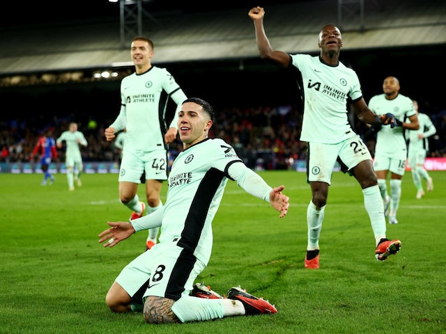 Chelsea's Enzo Fernandez celebrates scoring their third goal with teammates on February 12, 2024