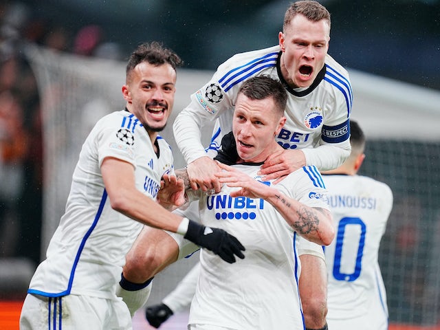 FC Copenhagen's Lukas Lerager celebrates scoring their first goal with teammates on December 12, 2023