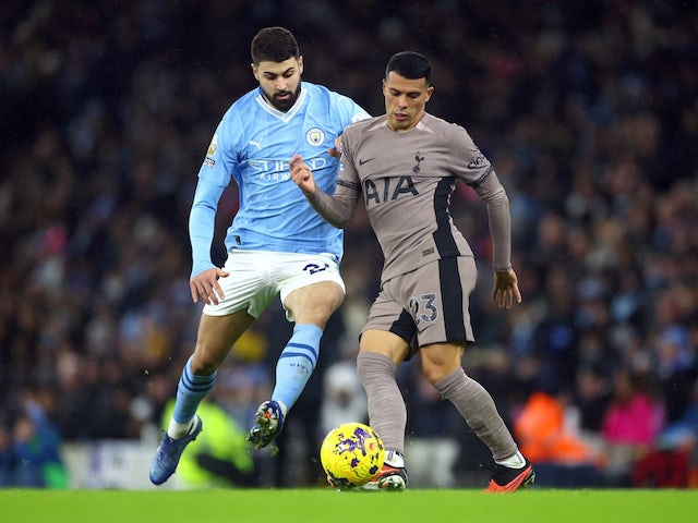 Manchester City's Josko Gvardiol in action with Tottenham Hotspur's Pedro Porro December 3, 2023