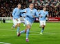 Manchester City's Phil Foden celebrates scoring their second goal with Erling Haaland and Julian Alvarez on February 5, 2024